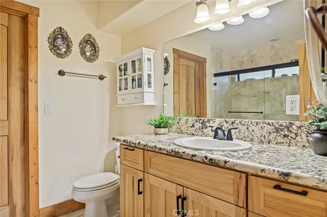 a balcony view with a seating space