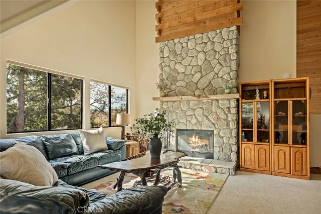 a bed room with two bed and a window