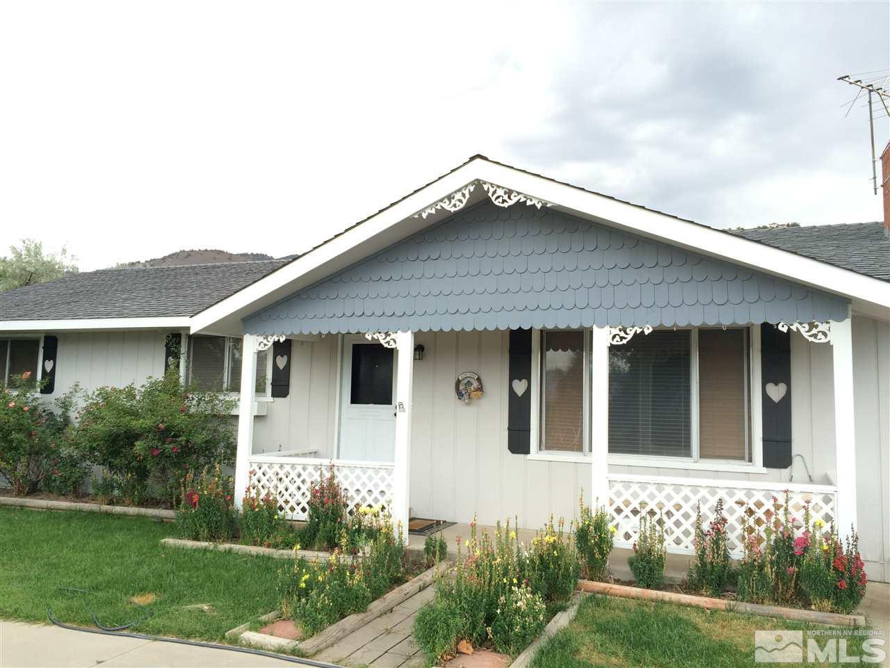 14720 Chamy Drive Reno, NV 89521 - Photo 1 of 1 a front view of a house with a yard