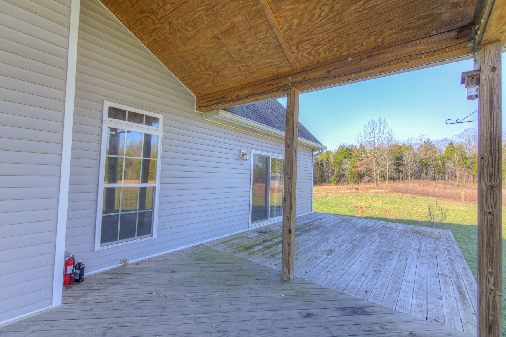 3201 Greens Mill Road Spring Hill, TN 37174 - Photo 54 of 57 a view of an empty room with wooden floor and a window