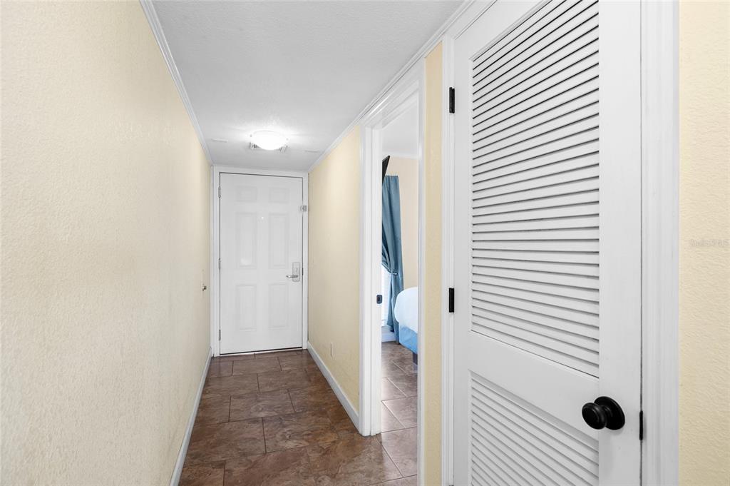 Undisclosed Address Tampa, FL 33607 - Photo 15 of 40 a view of a bathroom from a hallway