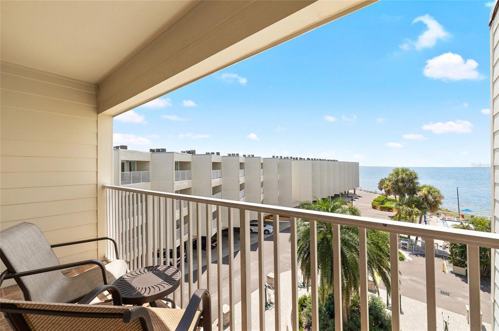 Undisclosed Address Tampa, FL 33607 - Photo 19 of 40 a view of a balcony with furniture