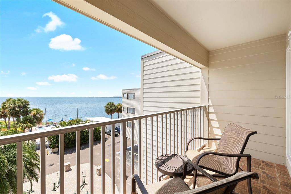 Undisclosed Address Tampa, FL 33607 - Photo 20 of 40 a view of a balcony with furniture