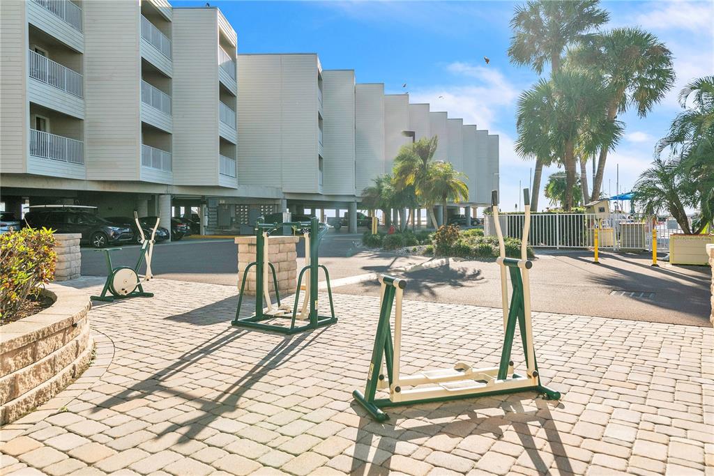 Undisclosed Address Tampa, FL 33607 - Photo 23 of 40 a view of a patio with a table and chairs