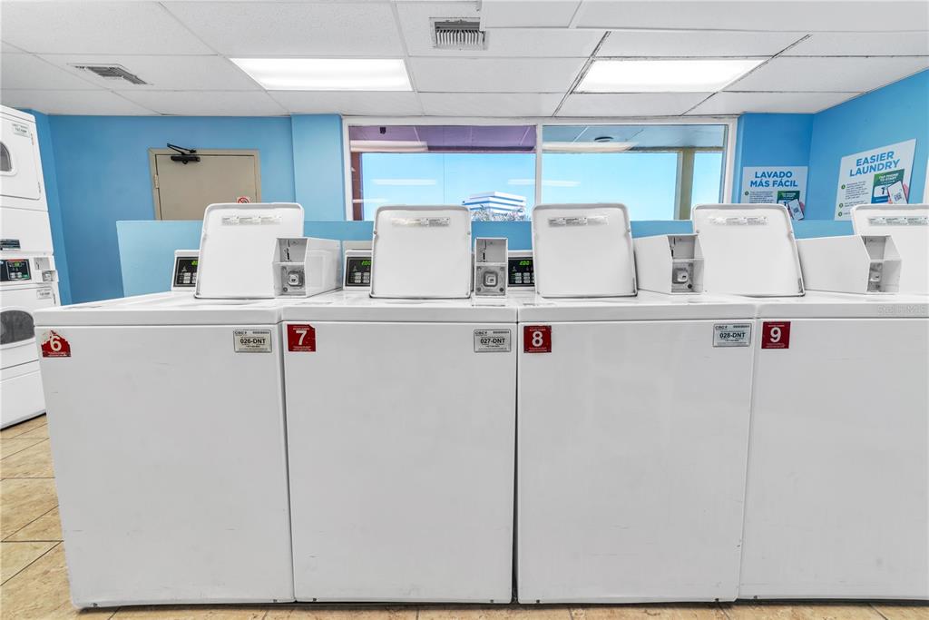Undisclosed Address Tampa, FL 33607 - Photo 38 of 40 a white refrigerator freezer sitting inside of a kitchen