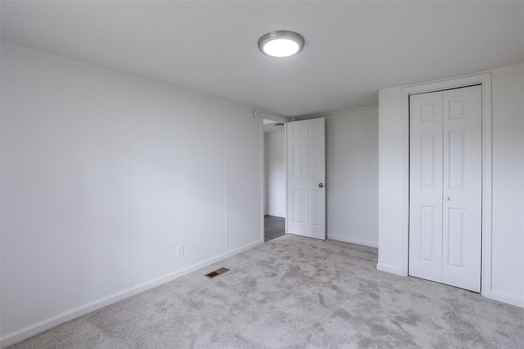 945 Walnut Street Azle, TX 76020 - Photo 21 of 29 a view of an empty room