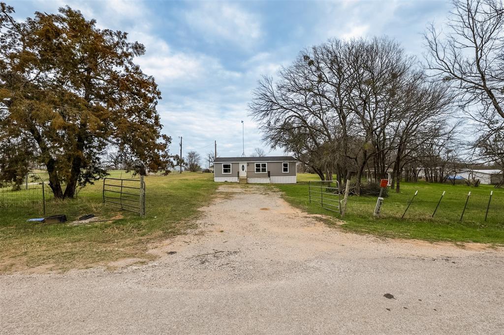 945 Walnut Street Azle, TX 76020 - Photo 4 of 29 a view of a park with large trees