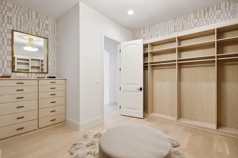 a utility room with sink dryer and washer