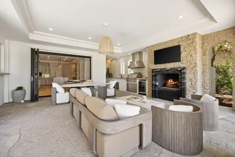 a bedroom with a bed and a fireplace