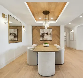 a kitchen with stainless steel appliances granite countertop a stove and a cabinets