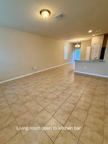 a view of a livingroom with a bathroom