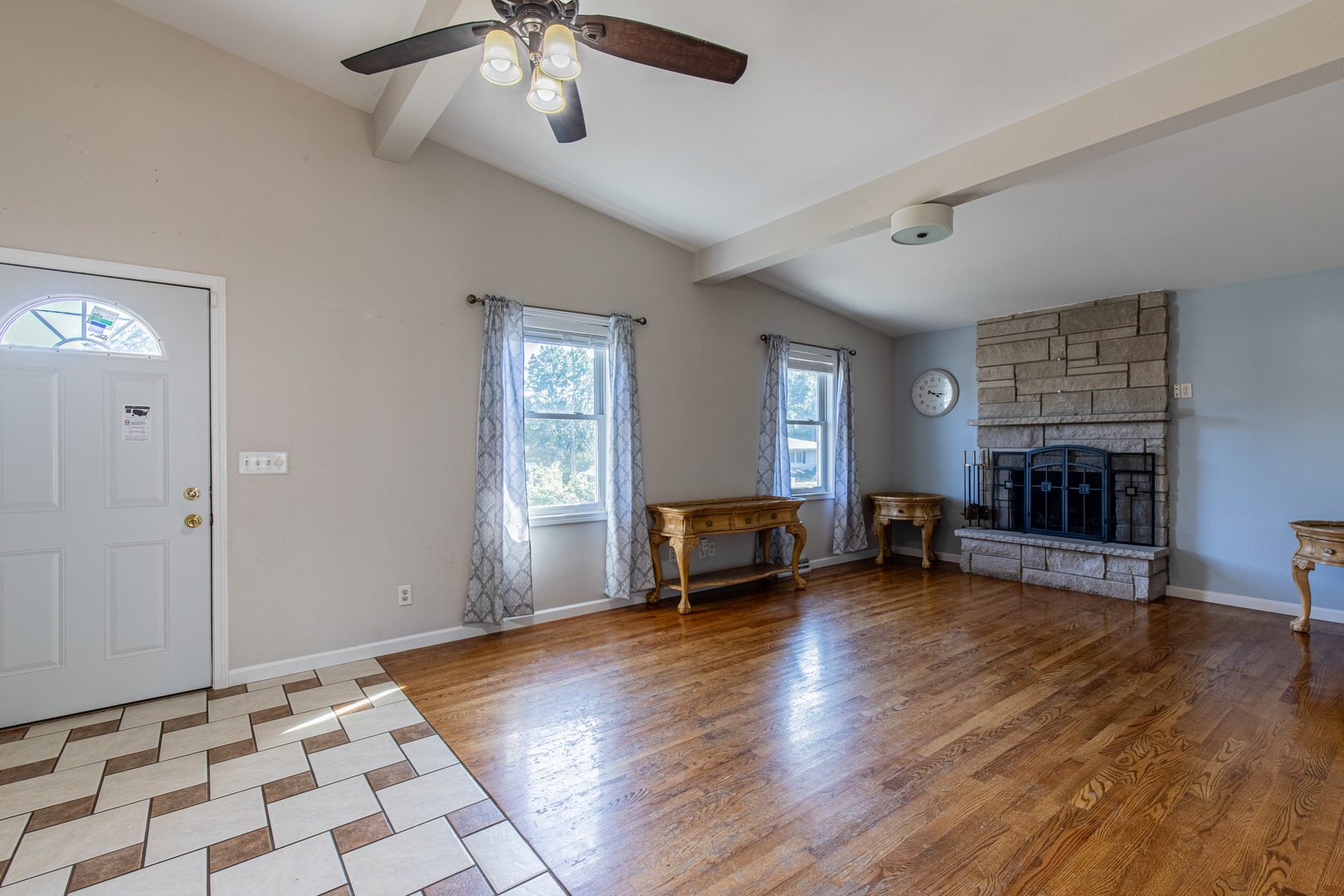 1106 Beech Drive Dixon, IL 61021 - Photo 2 of 32 a view of livingroom with hardwood floor and a ceiling fan