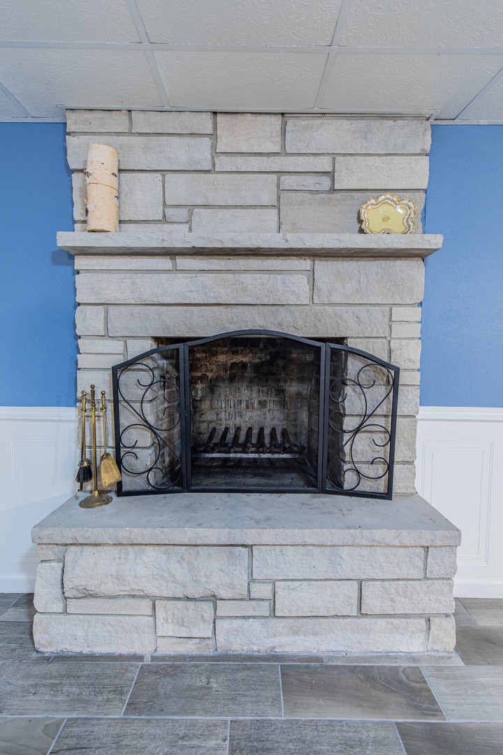 1106 Beech Drive Dixon, IL 61021 - Photo 24 of 32 a living room with furniture and a fireplace
