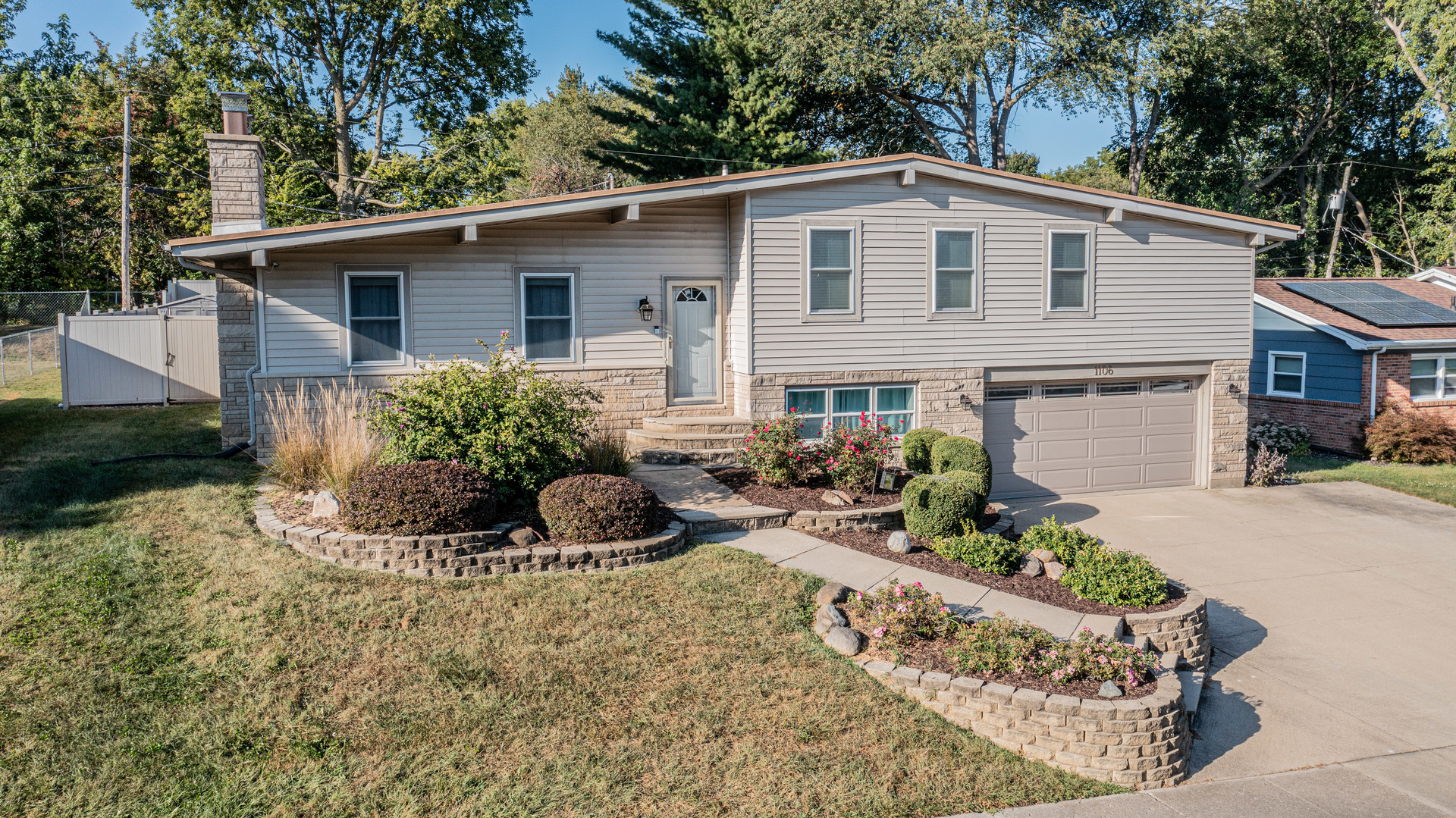 1106 Beech Drive Dixon, IL 61021 - Photo 30 of 32 a front view of house with yard and trees in the background