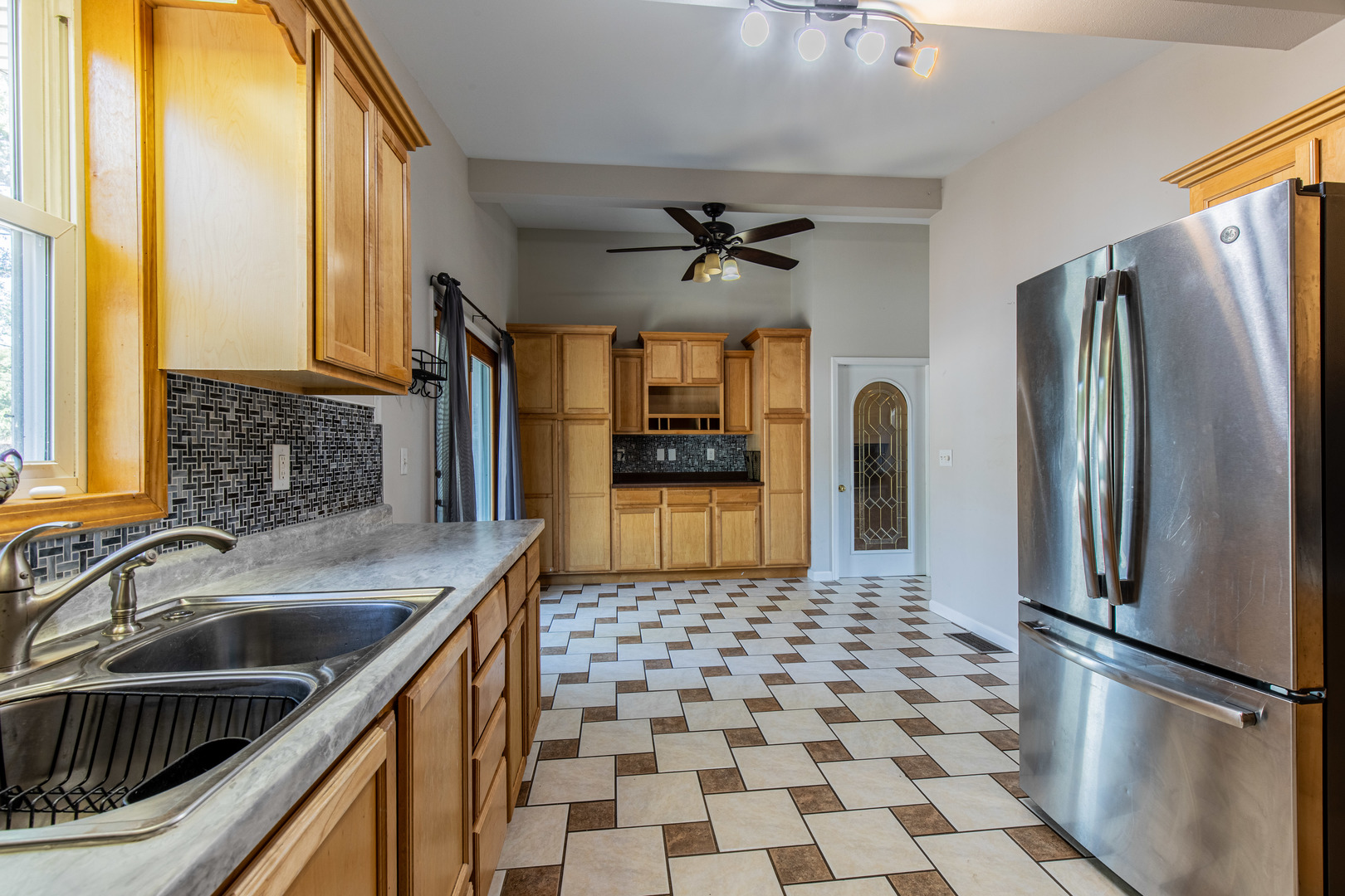 1106 Beech Drive Dixon, IL 61021 - Photo 9 of 32 a kitchen with stainless steel appliances granite countertop a refrigerator a sink and dishwasher