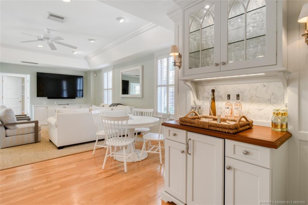 485 South Beach Road Hobe Sound, FL 33455 - Photo 12 of 72 a living room with furniture and a flat screen tv