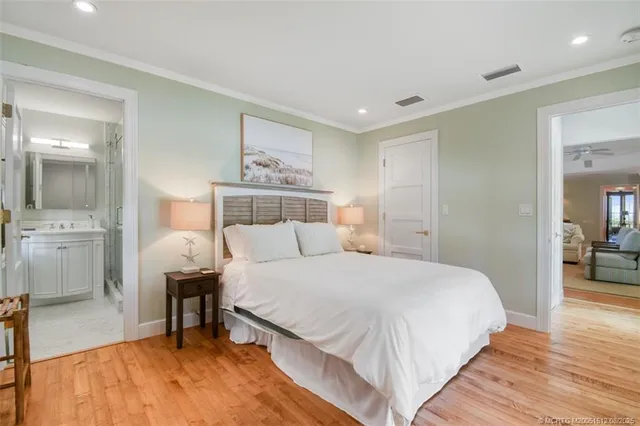 a living room with furniture large window and a flat screen tv