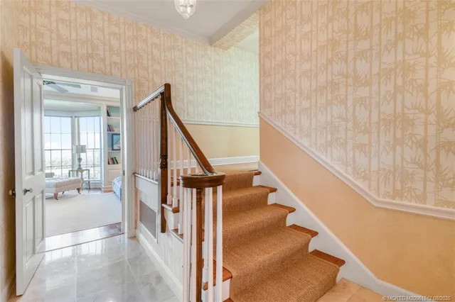 a utility room with sink dryer and washer