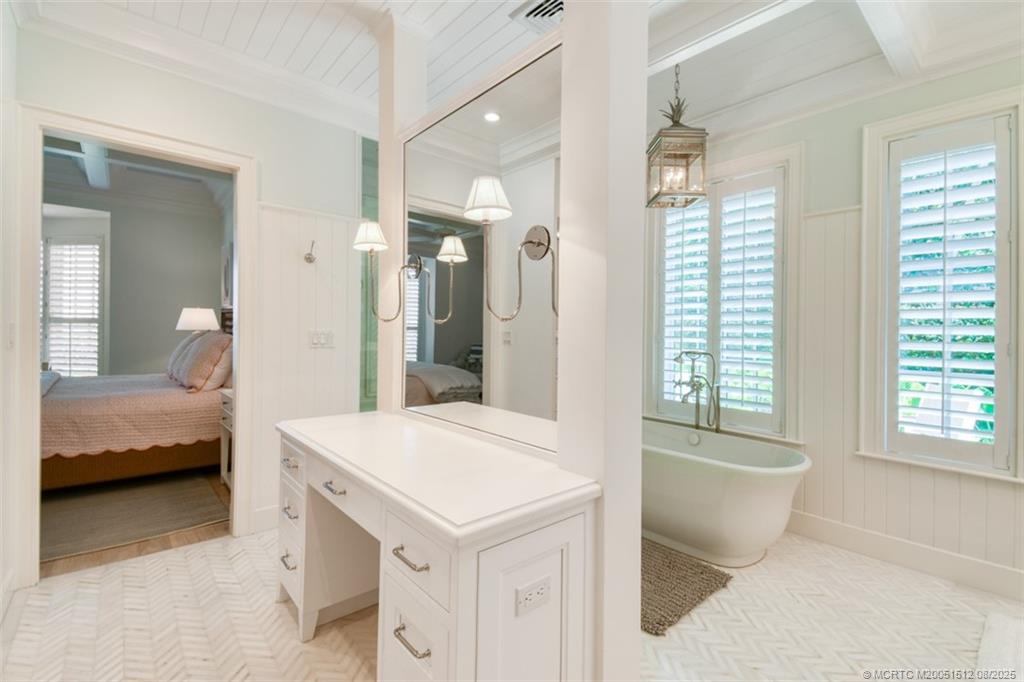 485 South Beach Road Hobe Sound, FL 33455 - Photo 34 of 72 a living room with a couch and a table