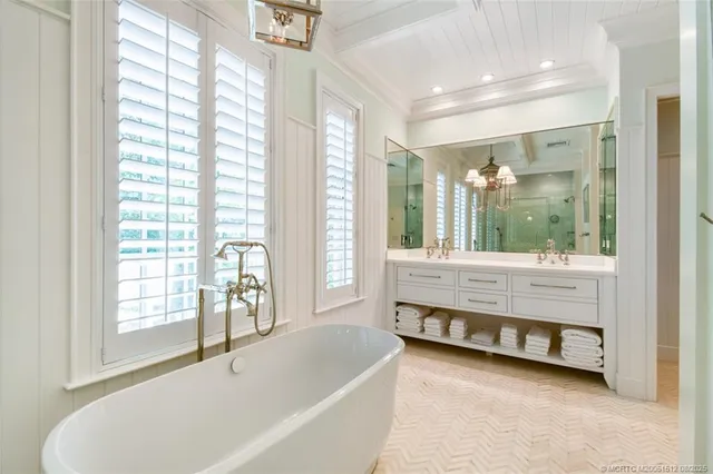 a view of balcony with wooden floor and fence