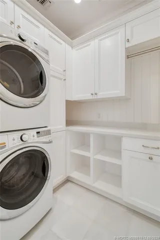 a bath tub sitting next to a window