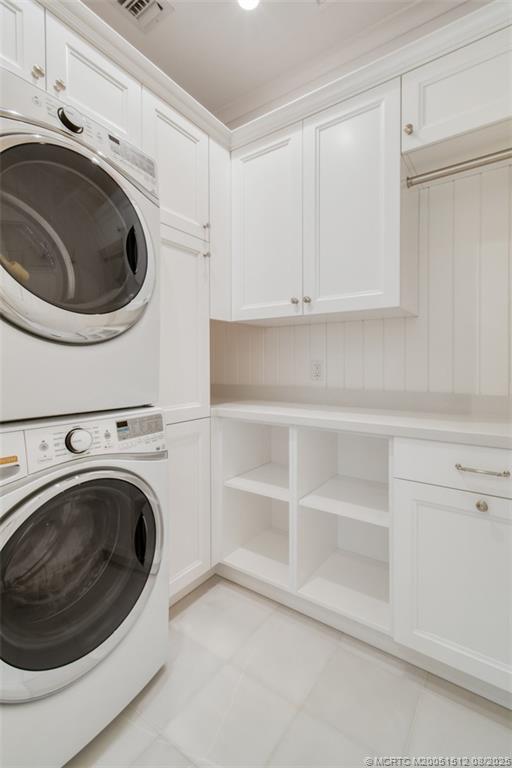 485 South Beach Road Hobe Sound, FL 33455 - Photo 37 of 72 a utility room with sink dryer and washer