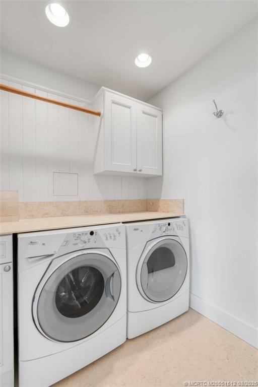 485 South Beach Road Hobe Sound, FL 33455 - Photo 52 of 72 a utility room with dryer and washer