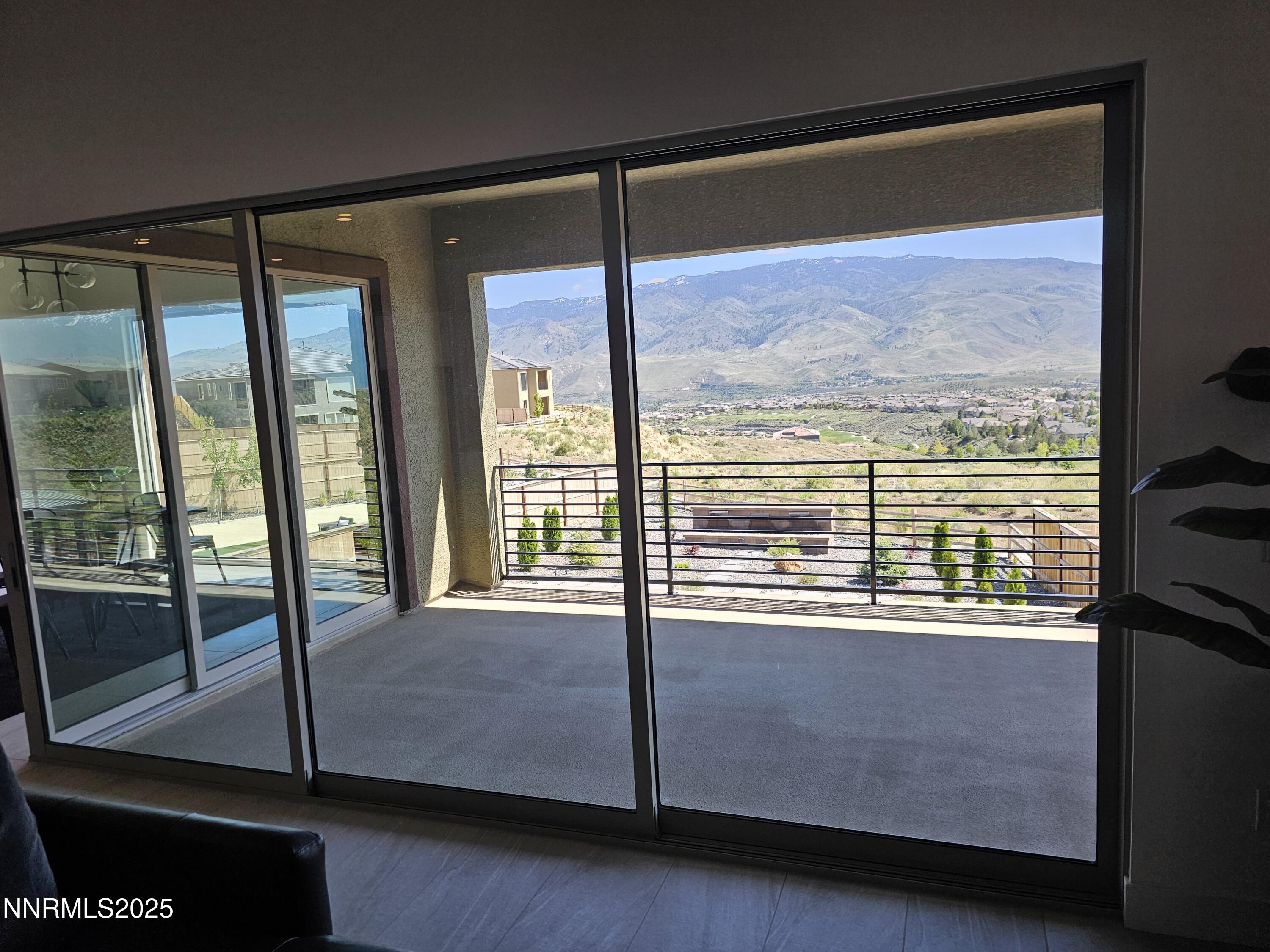 9110 Wild Skies Way Reno, NV 89523 - Photo 12 of 46 a view of a living room and window