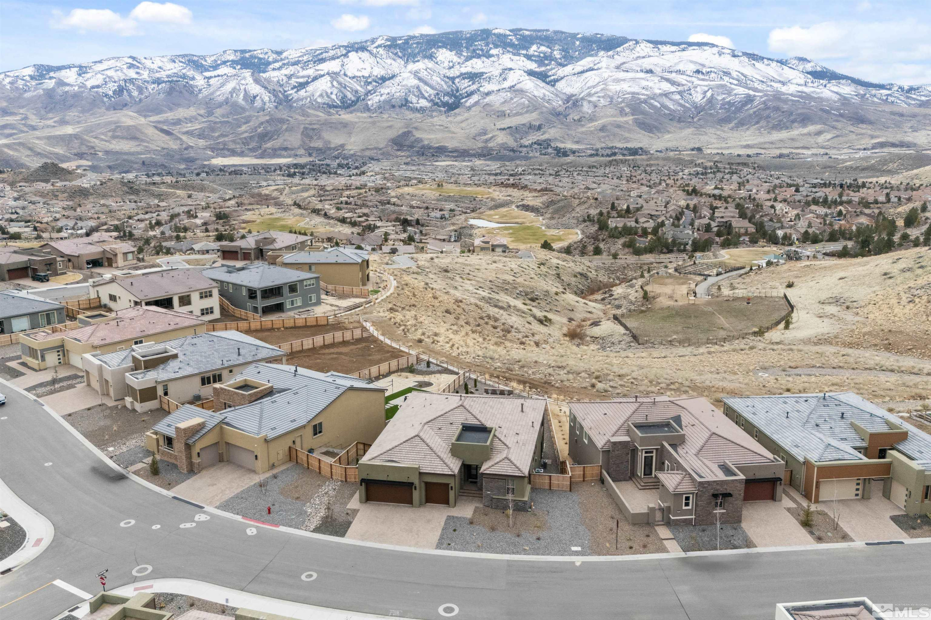 9110 Wild Skies Way Reno, NV 89523 - Photo 13 of 46 an aerial view of a house with a mountain