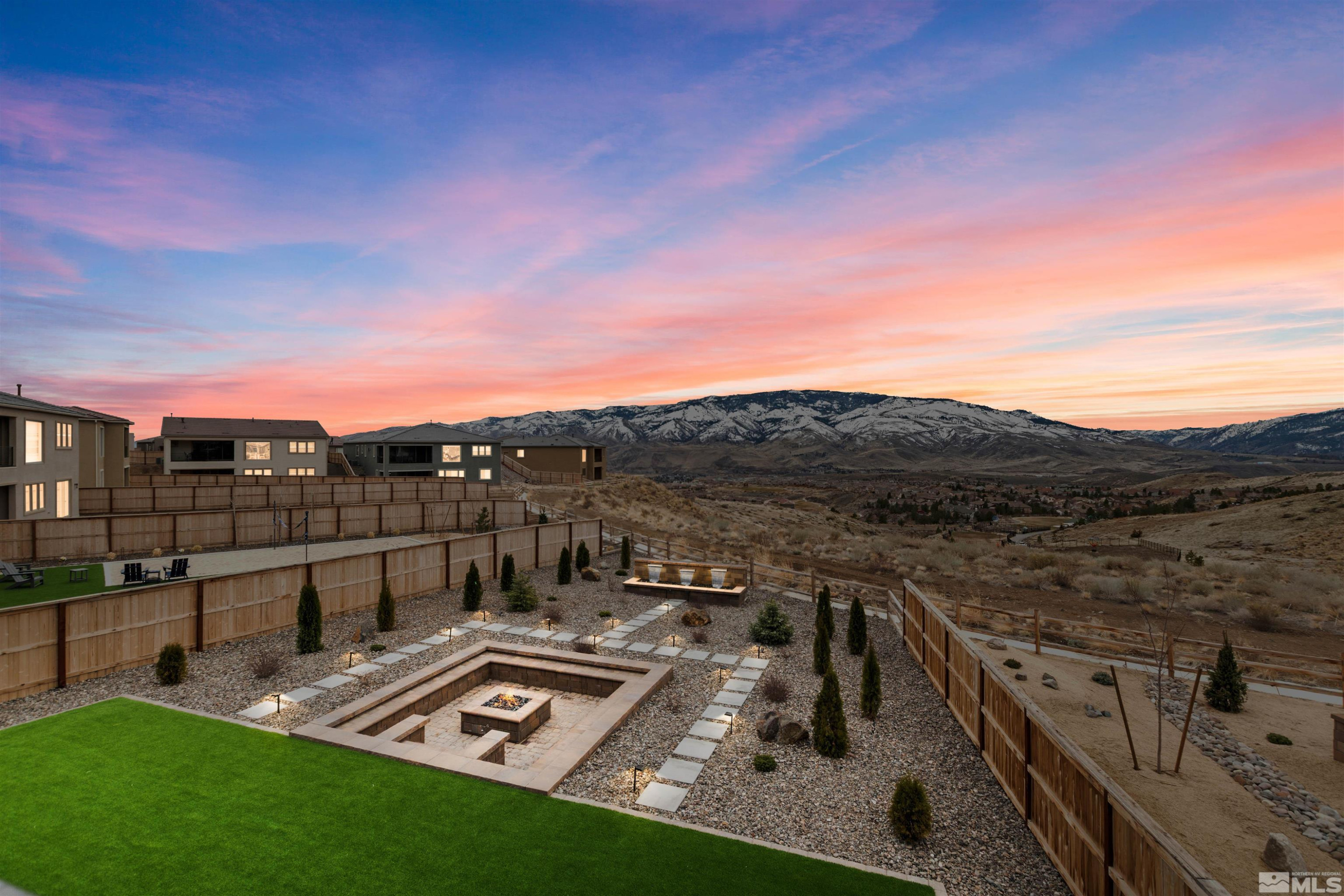 9110 Wild Skies Way Reno, NV 89523 - Photo 14 of 46 a view of a terrace with a yard
