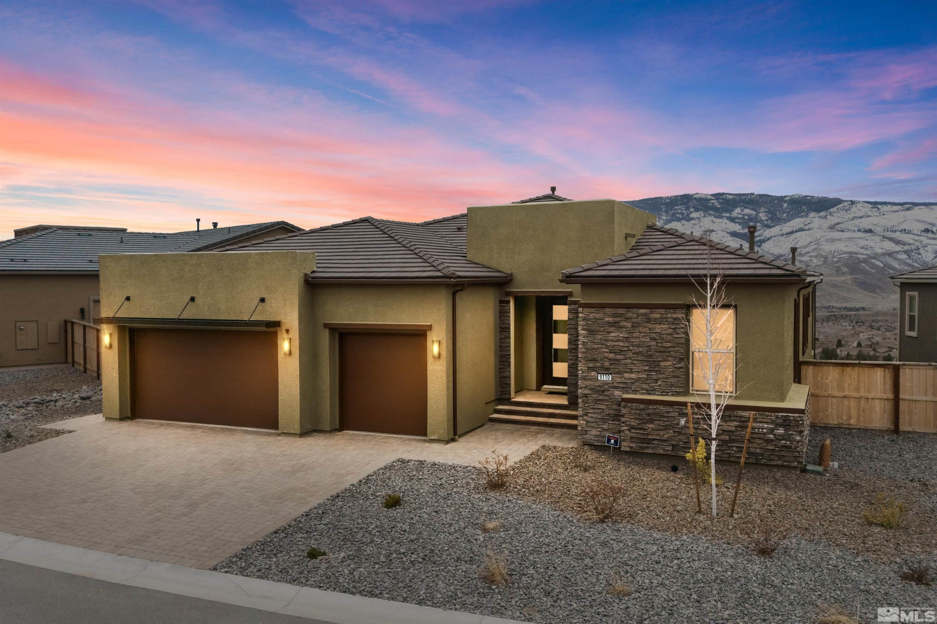9110 Wild Skies Way Reno, NV 89523 - Photo 2 of 46 front view of a house with a yard