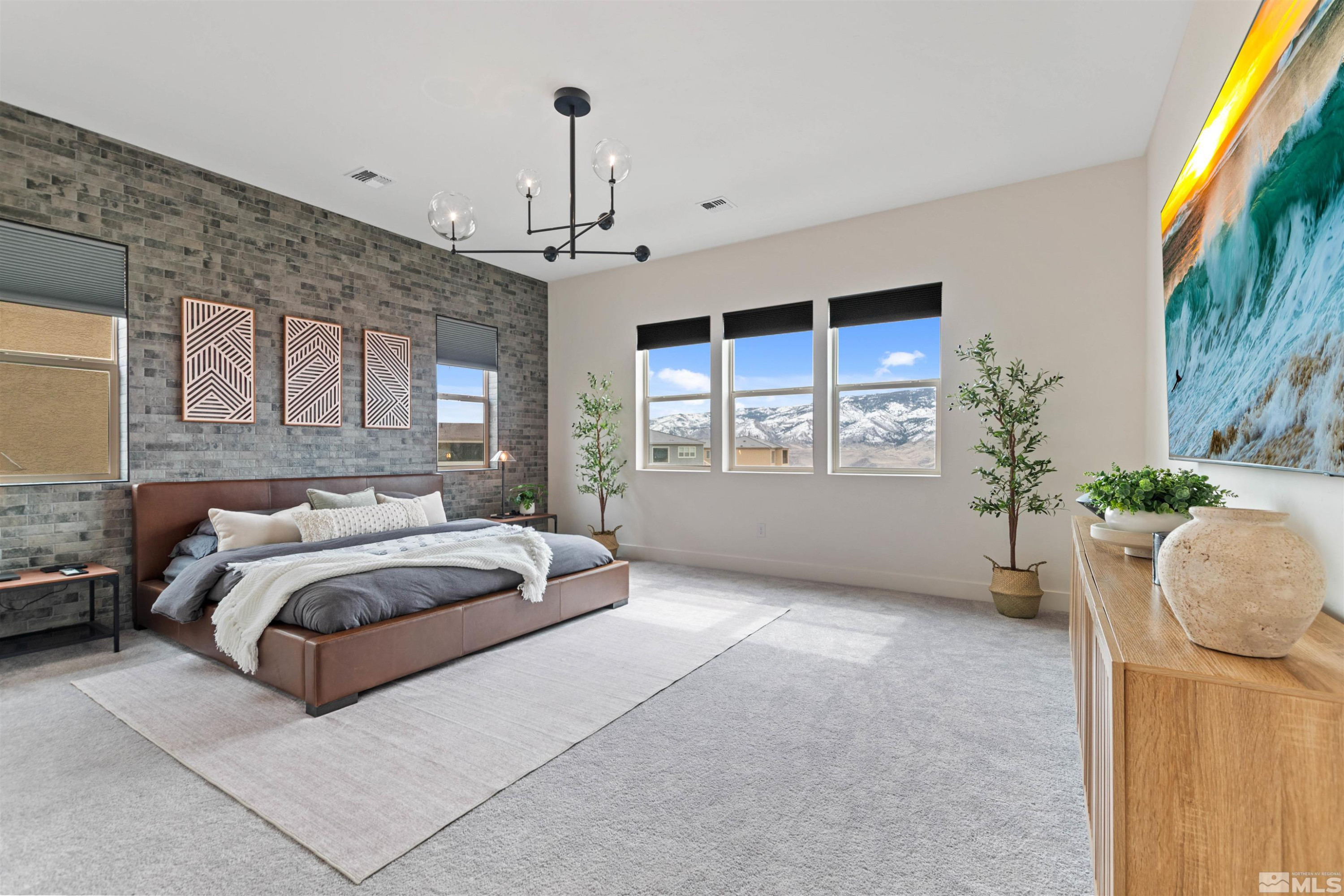 9110 Wild Skies Way Reno, NV 89523 - Photo 25 of 46 a spacious bedroom with a bed and a window