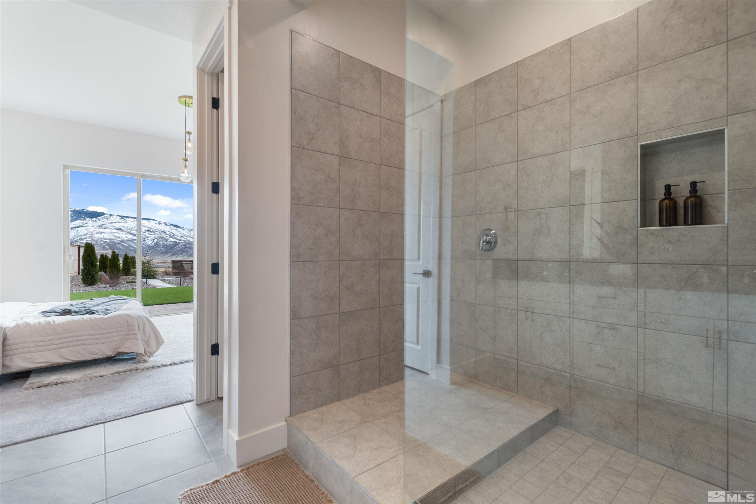 9110 Wild Skies Way Reno, NV 89523 - Photo 34 of 46 a bathroom with a shower