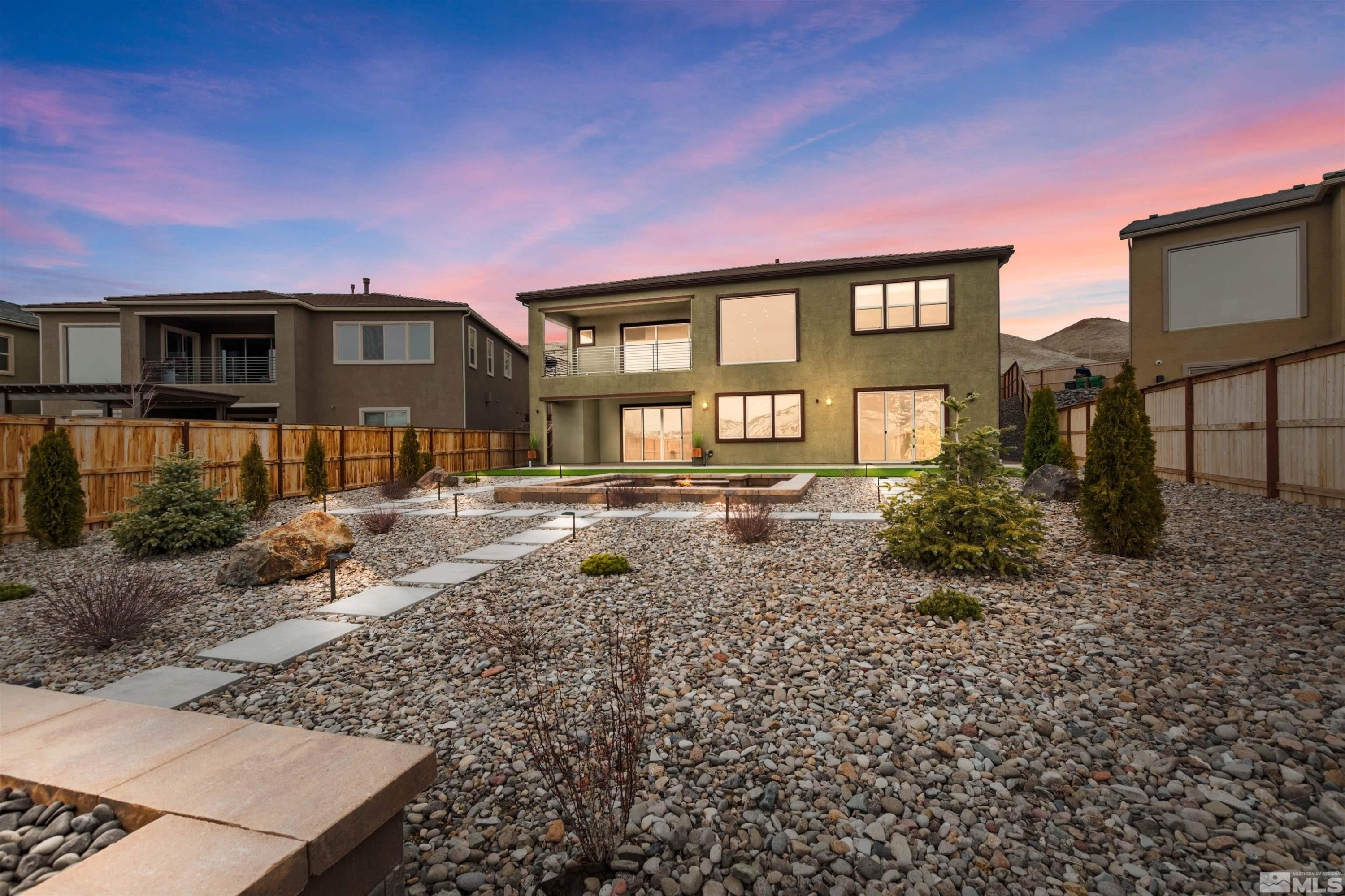 9110 Wild Skies Way Reno, NV 89523 - Photo 44 of 46 a front view of a house with a yard