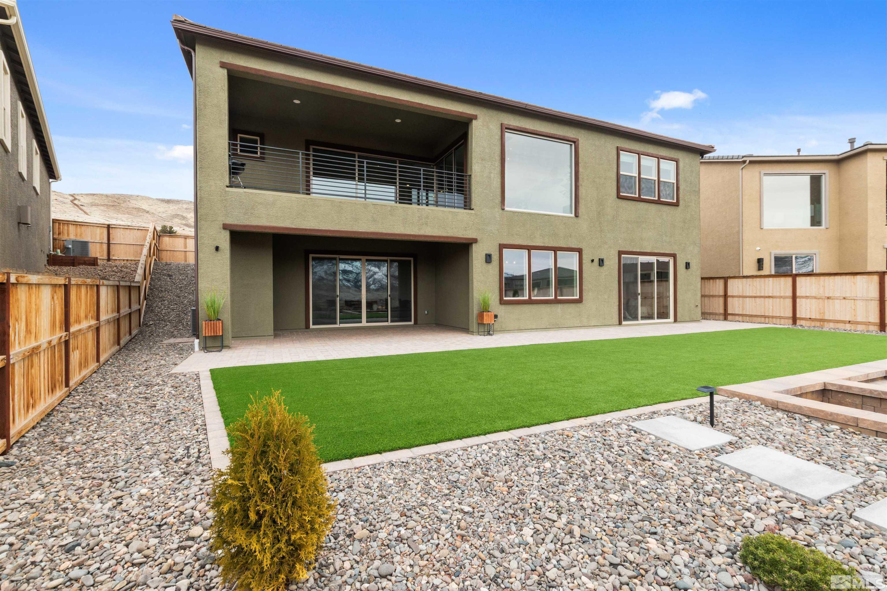9110 Wild Skies Way Reno, NV 89523 - Photo 45 of 46 a view of a house with a yard and sitting area