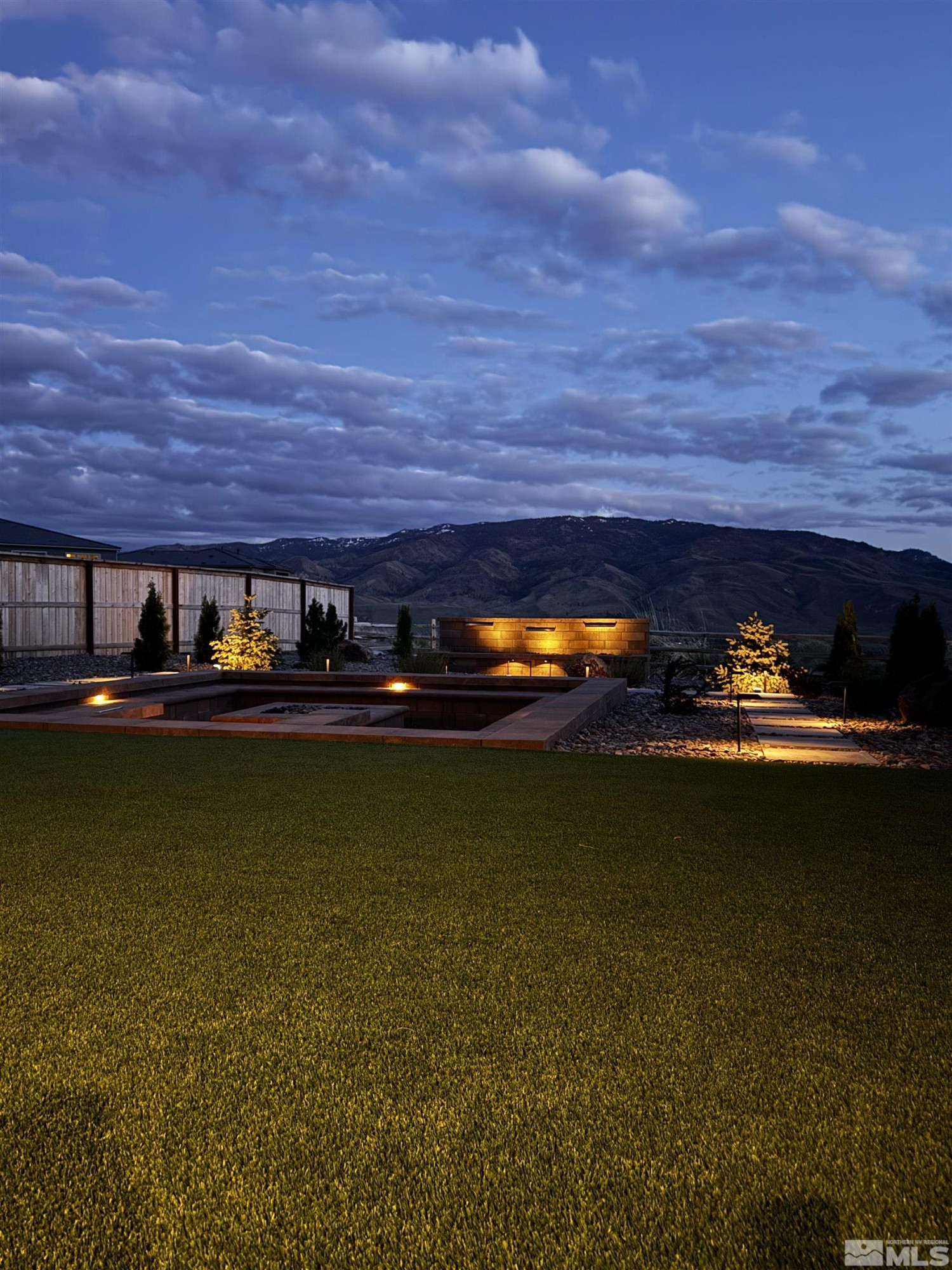 9110 Wild Skies Way Reno, NV 89523 - Photo 6 of 46 a view of a lake from a yard