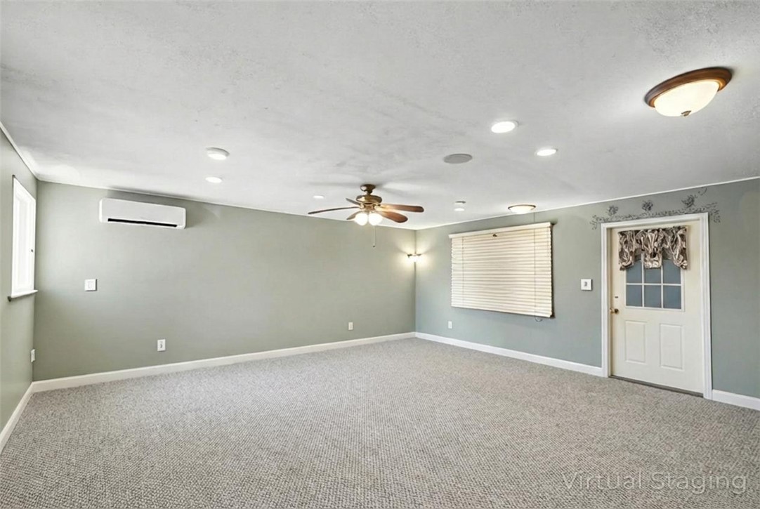 2250 Dillard Road Washington, TX 77880 - Photo 50 of 50 an empty room with windows and chandelier fan