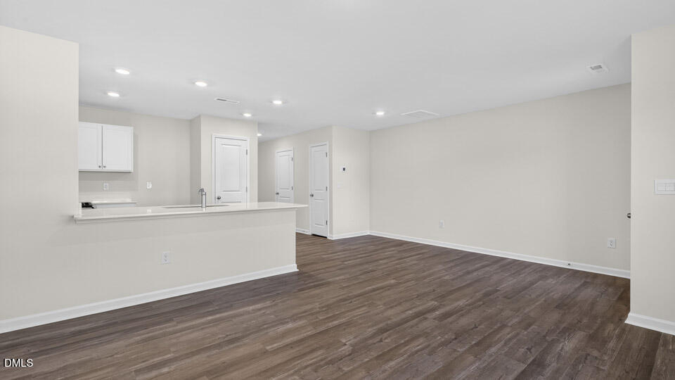 104 Clementine Street Angier, NC 27501 - Photo 9 of 27 a view of kitchen with wooden floor