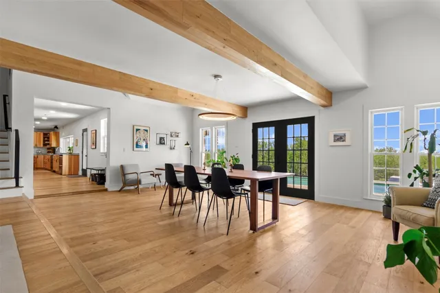 a bedroom with a bed and lamps