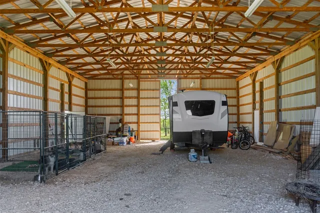 a view of a swimming pool and a yard