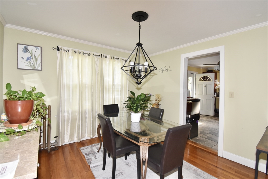 77 Dorset Street Springfield, MA 01108 - Photo 12 of 34 a view of a dining room with furniture window and wooden floor