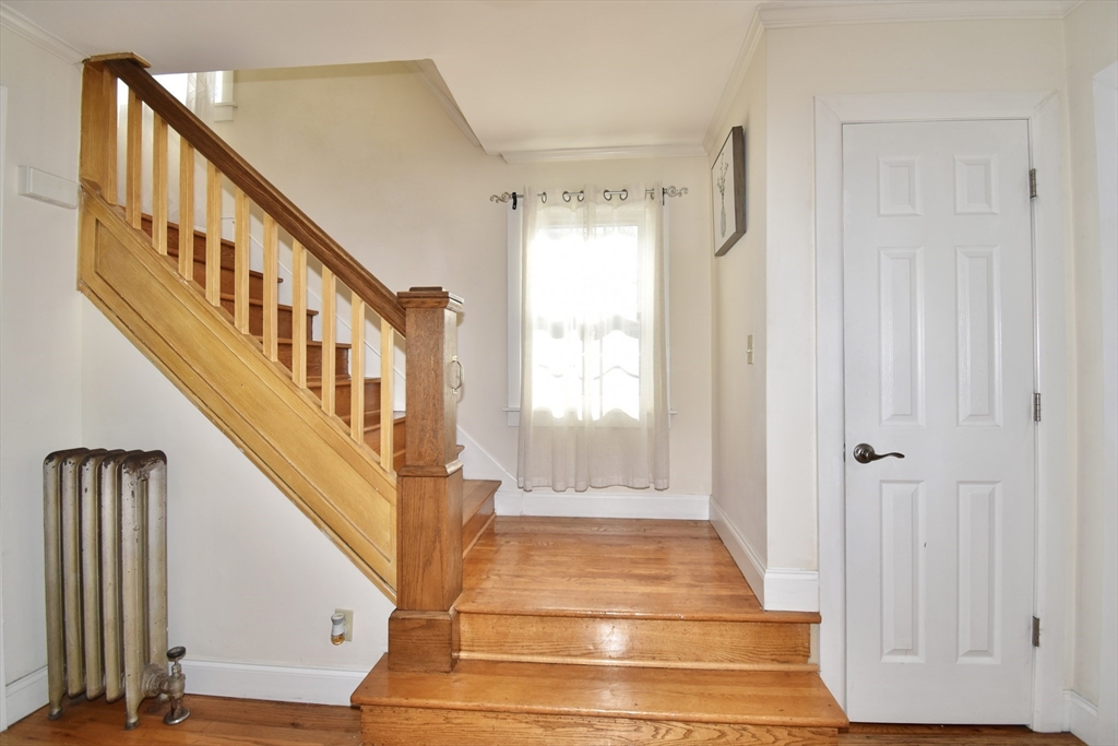 77 Dorset Street Springfield, MA 01108 - Photo 15 of 34 a view of an entryway with staircase