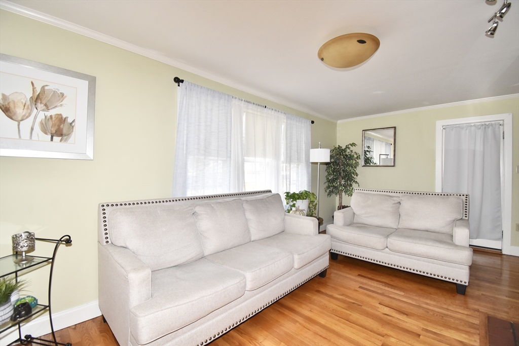 77 Dorset Street Springfield, MA 01108 - Photo 23 of 34 a living room with furniture and a large window