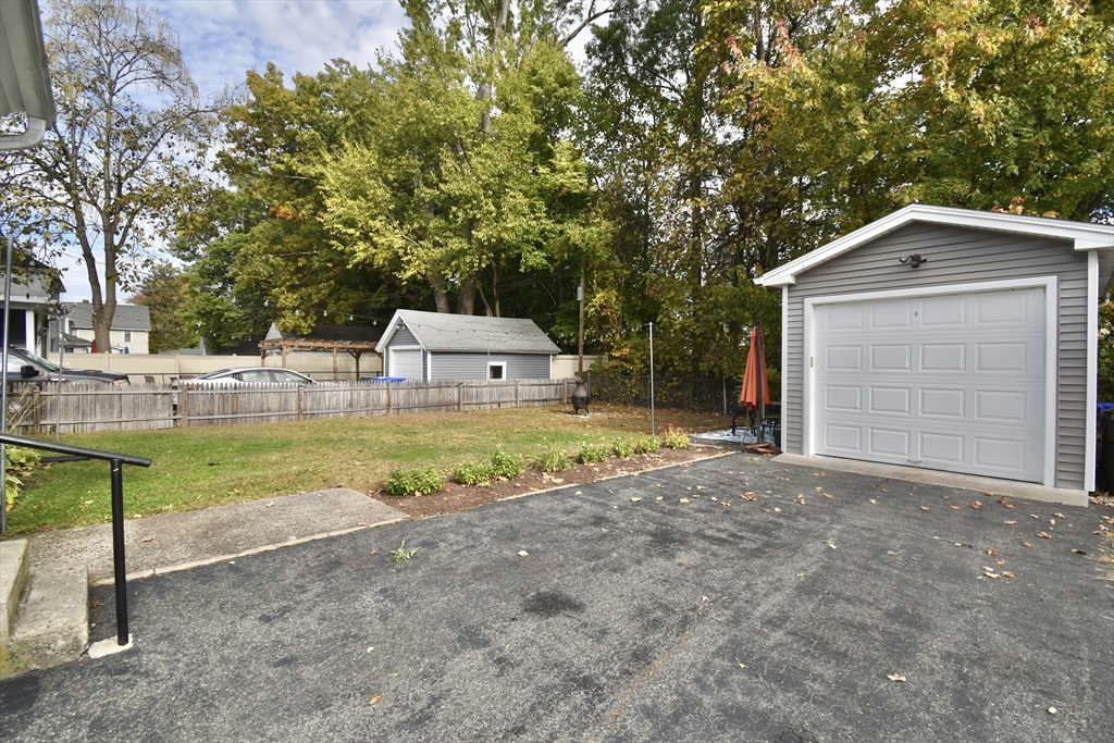 77 Dorset Street Springfield, MA 01108 - Photo 24 of 34 a view of a house with backyard and sitting area
