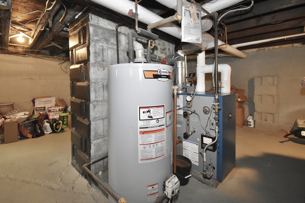 77 Dorset Street Springfield, MA 01108 - Photo 29 of 34 a utility room with dryer and washer