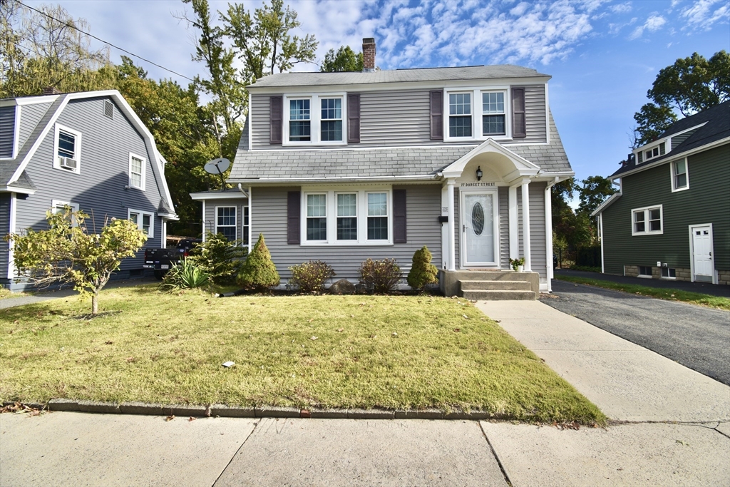 77 Dorset Street Springfield, MA 01108 - Photo 3 of 34 a front view of house with yard