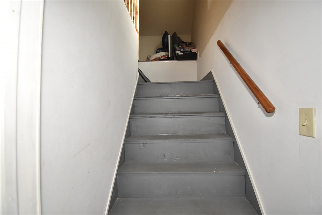 77 Dorset Street Springfield, MA 01108 - Photo 31 of 34 a view of entryway and hall with wooden floor
