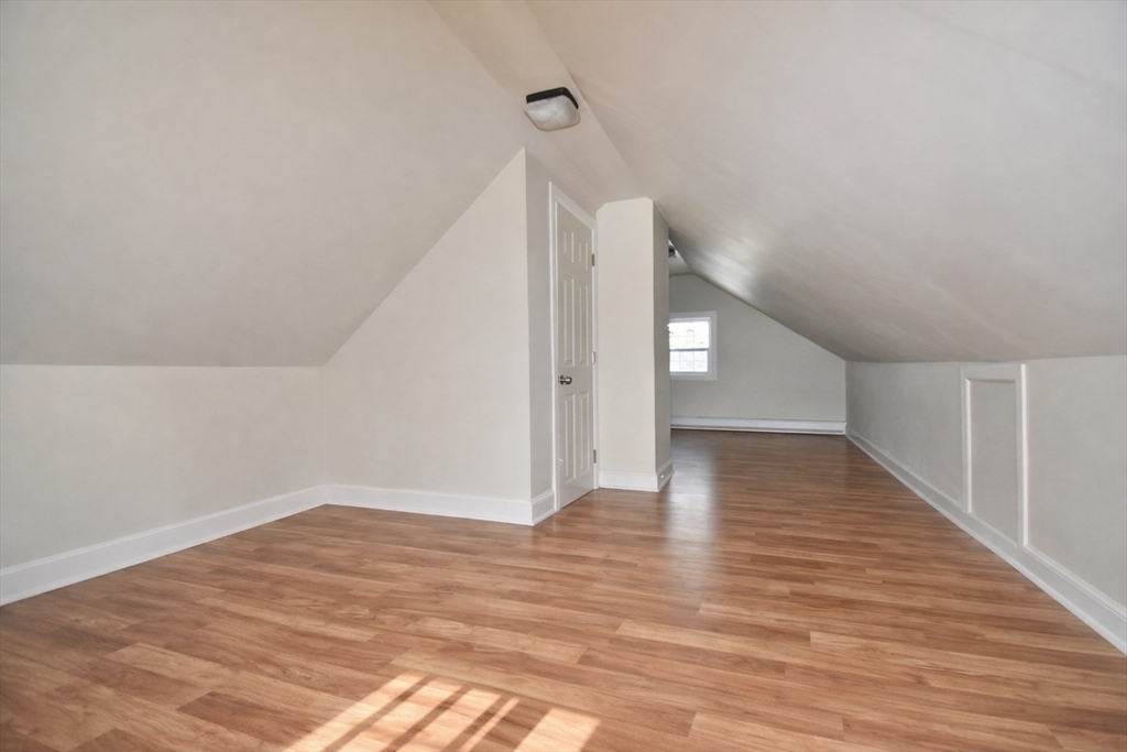 77 Dorset Street Springfield, MA 01108 - Photo 32 of 34 a view of empty room with wooden floor