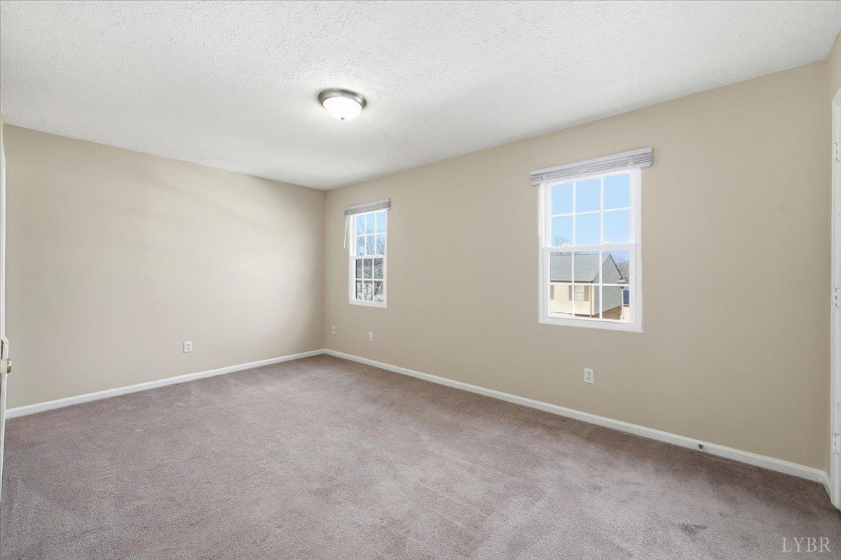 154 Kitty Hawk Square Lynchburg, VA 24502 - Photo 19 of 30 an empty room with windows