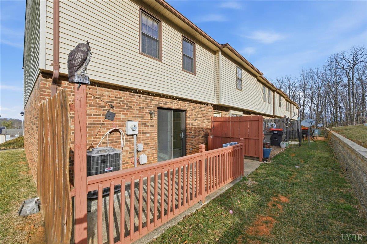 154 Kitty Hawk Square Lynchburg, VA 24502 - Photo 23 of 30 a view of a street with wooden fence